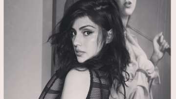 Rhea Chakraborty looks glamorous in sheer black top, talks about being fearless