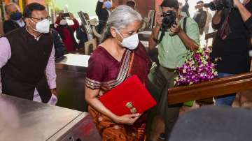 Union Minister of Finance Nirmala Sitharaman with MoS Pankaj Chaudhary arrives at Parliament for the presentation of the Union Budget 2022-23, in New Delhi, Tuesday, Feb 1, 2022. 