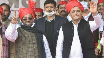 Former UP minister Swami Prasad Maurya joins the Samajwadi Party in presence of party president Akhilesh Yadav at SP office in Lucknow, Friday, Jan. 14, 2022.?