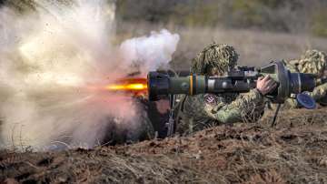 A Ukrainian serviceman fires an NLAW anti-tank weapon during an exercise in the Joint Forces Operation, in the Donetsk region, eastern Ukraine, Tuesday, Feb. 15, 2022. 