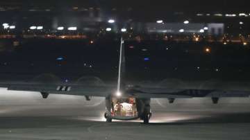 U.S. Army soldiers unload equipment from a transport plane at the Rzeszow-Jasionka airport in southeastern Poland, on Friday, Feb. 4, 2022. Poland's Defense Ministry says that additional U.S. troops begin arriving in Poland after President Joe Biden ordered the deployment of 1,700 soldiers to the country to demonstrate America’s commitment to NATO’s eastern flank amid fears of a Russian invasion of Ukraine.