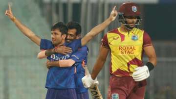 Ravi Bishnoi celebrates after taking the wicket of Brendon King in his first over of 2nd T20I agains