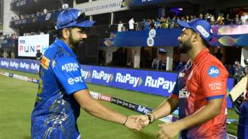 Rohit Sharma and Rishabh Pant shaking hands after the match between MI and DC in IPL 2022