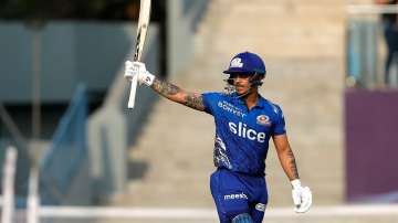 Mumbai Indians opener Ishan Kishan celebrates his fifty against Delhi Capitals in IPL 2022