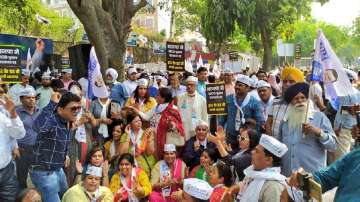 AAP workers protest against BJP over delay in holding MCD civic polls. 