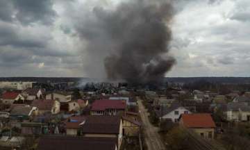 ?A factory and a store burn after being bombarded in Irpin, on the outskirts of Kyiv, Ukraine?