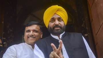 AAP MP and Punjab CM-designate Bhagwant Mann with AAP MP Sanjay Singh, during the second part of Budget Session, at Parliament House.