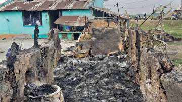 Charred remains of the houses after some miscreants set the houses on fire in Rampurhat in Birbhum district, Tuesday, March 22, 2022. 