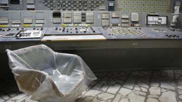 An operator's chair covered with plastic sits in an empty control room of the 3rd reactor at the Chernobyl nuclear plant, in Chernobyl, Ukraine, on April 20, 2018.?