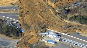 A landslide caused by a strong earthquake covers a circuit course in Nihonmatsu city, Fukushima prefecture, northeastern Japan.