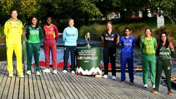 All 8 team captains posing with ICC Women's World Cup 2022 trophy