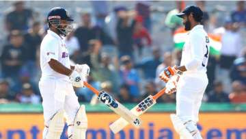 Rishabh Pant and Ravindra Jadeja celebrate after putting a good partnership in 1st Test