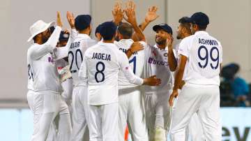 Indian players celebrate after taking a wicket during IND vs SL 2nd Test in Bengaluru
