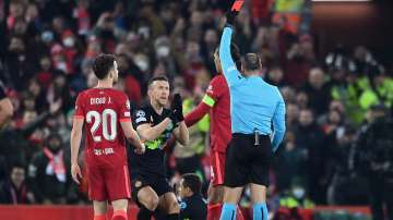 Referee Antonio Mateu Lahoz sends off Inter Milan's Alexis Sanchez (below) as Ivan Perisic (in black