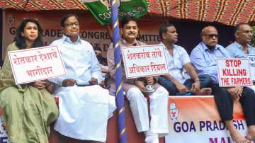 P Chidambaram, Dinesh Gundu Rao, Digambar Kamat, Goa Congress president Girish Chodankar and other Congress activists stage a protest against Lakhimpur Kheri violence, in Panaji, Monday, Oct. 11, 2021.