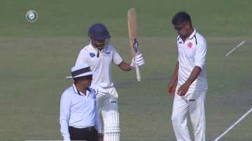 Shahbaz Nadeem of Jharkhand celebrates after hitting a ton against Nagaland in the Pre Quarter-Final