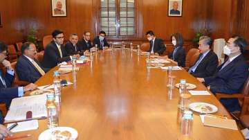 China's Foreign Minister Wang Yi with NSA Ajit Doval during a delegation-level meeting, at the South Block, in New Delhi, Friday, March 25, 2022.