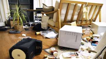 Furniture and electrical appliance are scattered at an apartment in Fukushima, northern Japan Wednesday, March 16, 2022, following an earthquake.