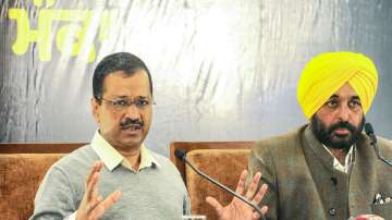 Delhi Chief Minister & AAP convener Arvind Kejriwal with AAPs chief ministerial candidate Bhagwant Mann.