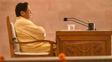 BSP chief Mayawati attends a review meeting with BSP leaders, to discuss the party's performance in the recent Assembly polls, at the party office, in Lucknow, Sunday, March 27.