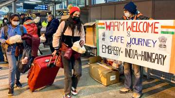 Indian nationals board a special Air India flight, evacuating Indians from war-torn Ukraine, in Budapest on FEB. 28, 2022.