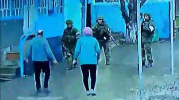 The CCTV footage shows a few armed Russian soldiers barging into the house of the elderly couple