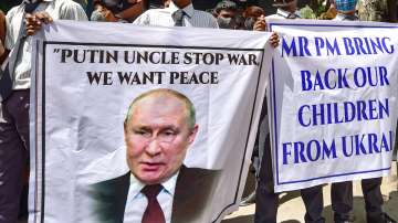 Students holding placards, stage a protest against Russias military invasion in Ukraine, in Bengaluru, Thursday, March 3, 2022.