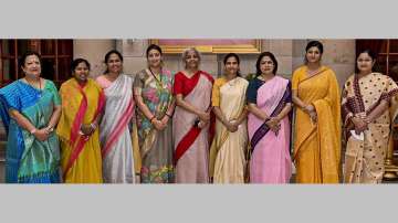 Union Finance Minister Nirmala Sitharaman and Women and Child Development Minister Smriti Irani with newly sworn-in ministers- Darshana Jardosh, Pratima Bhoumik, Shobha Karandlaje, Bharati Pawar, Meenakshi Lekhi, Anupriya Patel and Annapurna Devi Yadav- in New Delhi, Wednesday, July 7, 2021.
 
