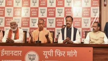 Uttar Pradesh Chief Minister Yogi Adityanath speaks during a press conference for the seventh and last phase of UP Assembly elections at the BJP office, in Lucknow.
