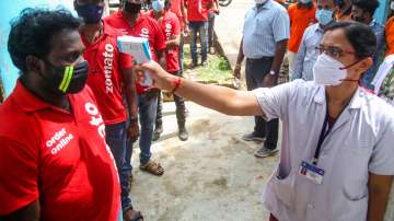 Food delivery men of Zomato take COVID-19 test at Krishnankovil Primary Health Centre in Nagercoil, Wednesday, May 12, 2021.