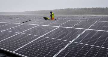 Solar panels are installed at a floating photovoltaic plant on a lake in Haltern, Germany, on April 1, 2022. Russia's Gazprom says it is halting natural gas supplies to Poland and Bulgaria, escalating tensions between the Kremlin and Europe over energy and Russia's invasion of Ukraine — and adding new urgency to plans to reduce and then end the continent's dependence on Russia as a supplier of oil and gas.?