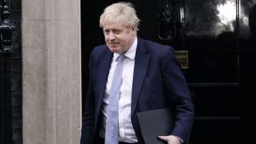 Britain's Prime Minister Boris Johnson leaves 10 Downing Street as he makes his way to the House of Commons, in London, Monday, Jan. 31, 2022.?