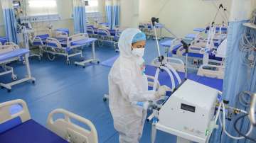 A health worker prepares a pediatric Covid-19 ward at a hospital.