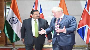 Adani Group Chairman Gautam Adani hosts British Prime Minister Boris Johnson at Adani global headquarters.