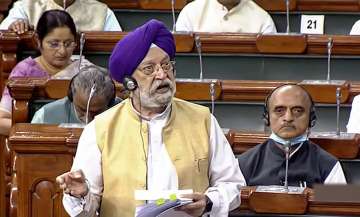Union Minister for Petroleum and Natural Gas Hardeep Singh Puri speaks in the Lok Sabha during the second part of Budget Session of Parliament, in New Delhi.