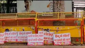 Hindu Sena puts up posters outside Congress Headquarters.