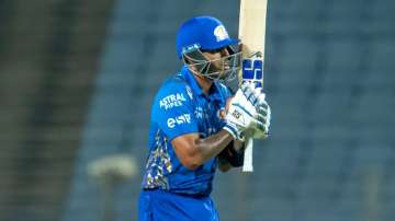 Mumbai Indian batsman Suryakumar Yadav celebrates after scoring a fifty in IPL 2022