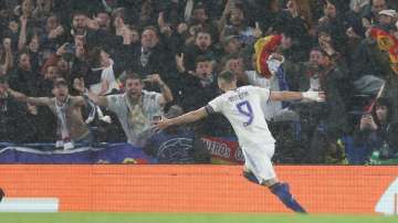 Karim Benzema celebrates his hat-trick