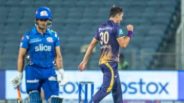 Pat Cummins celebrates after taking wicket of Ishan Kishan