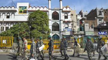 Security personnel patrol in the violence-hit Jahangirpuri area, in New Delhi, Wednesday, April 20, 2022. 