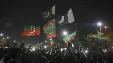 Supporters of former Prime Minister Imran Khan chant slogans during a protest after a no-confidence vote, in Islamabad, Pakistan.