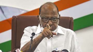 Nationalist Congress Party chief Sharad Pawar addresses a press conference in Mumbai, Wednesday, Oct. 13, 2021.