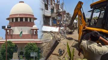 Supreme Court of India/Bulldozers being used to remove illegal structures during a joint anti-encroachment drive by NDMC, PWD, local bodies and the police, in the violence-hit Jahangirpuri area, in New Delhi, Wednesday, April 20, 2022. 