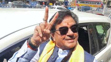 TMC leader and Bollywood actor Shatrughan Sinha flashes the victory sign after winning Asansol Lok Sabha seat, in Asansol, Saturday, April 16, 2022.