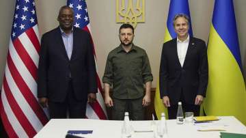 US Secretary of Defense Lloyd Austin, Ukrainian President Volodymyr Zelenskyy and US Secretary of State Antony Blinken pose for a picture during their meeting in Kyiv, Ukraine. 