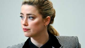 Witness calls Amber Heard 'jealous and crazy'