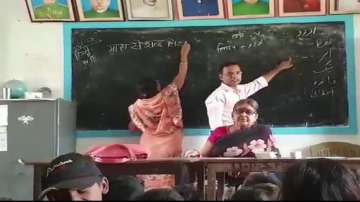 Students in a Bihar school were being taught Hindi and Urdu on either side of the same blackboard in the same class.