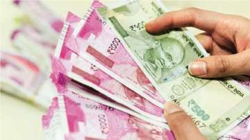 Rupee gains 57 paise