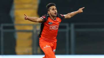 Umran Malik celebrating after taking a wicket