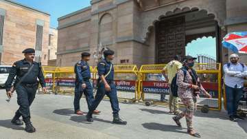 Security personnel guard outside the Gyanvapi mosque after its survey by a commission, in Varanasi.